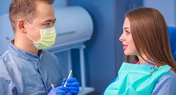 Female patient learning about the cost of cosmetic dentistry in Daytona Beach